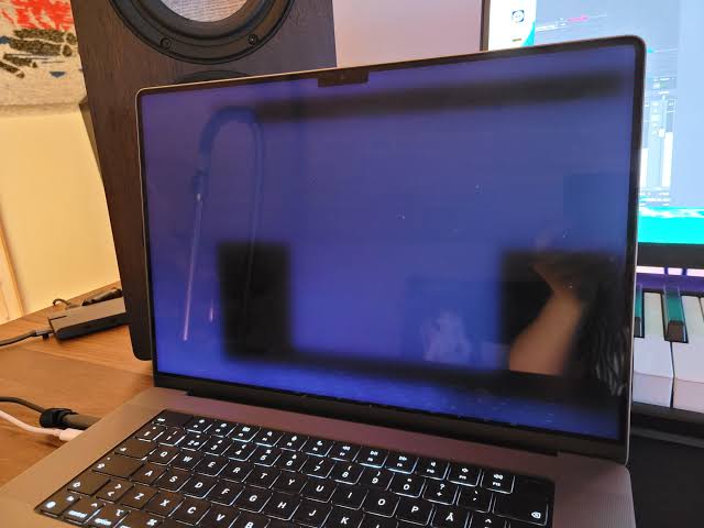 MacBook won't turn on black screen showing a faint image from a failed backlight